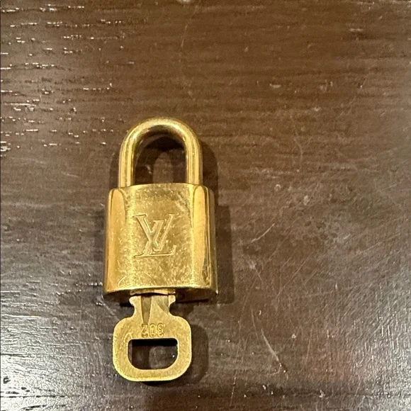 Beautiful Authentic Louis Vuitton Lock and Key Set - Picture 1 of 4